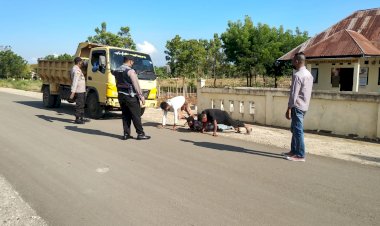 Kapolsek-Nagawutung-IPDA-Akhmad-A.-Peuohaq,-S.-Pd.,-SH.---Himbau-Masyarakat-Terapkan-Protkes-Dalam-Beraktivitas-Dan-Patuhi-PPKM.